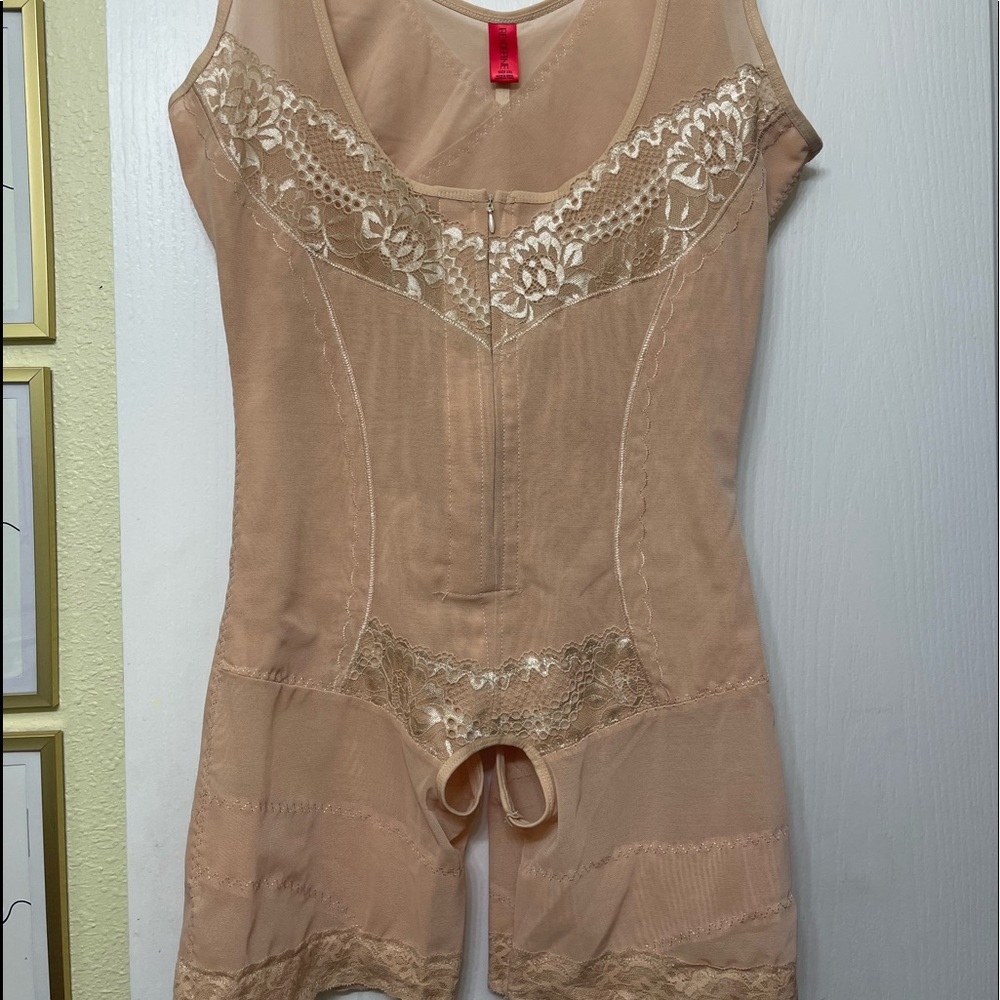 Brand new never worn; just tried on.  Not tight enough for me